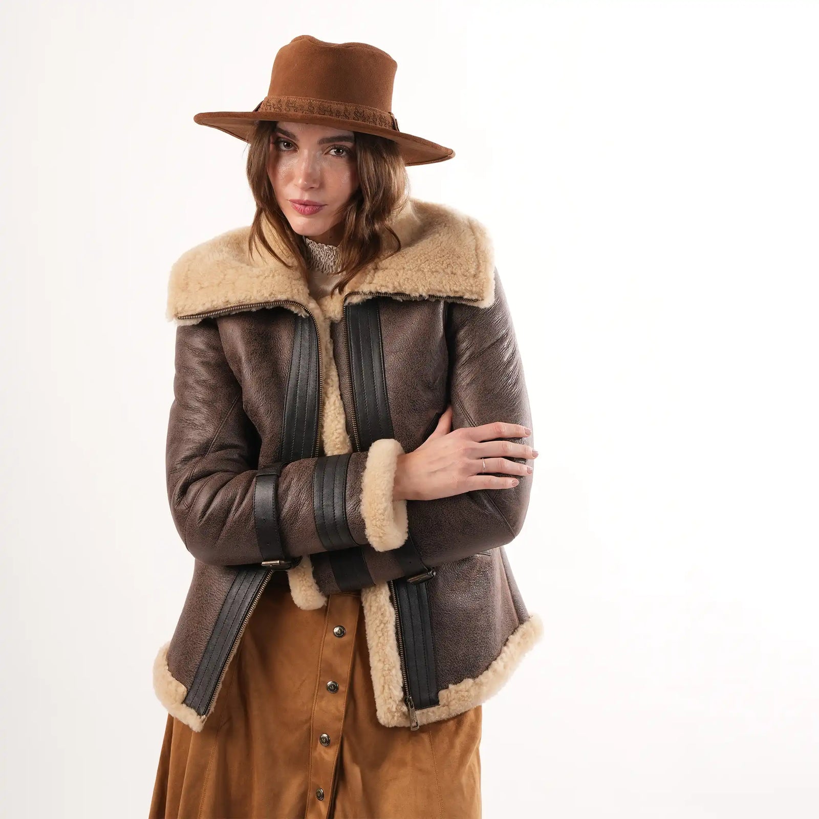 Women’s shearling and sheepskin leather jackets with warm lined design, classic aviator styling and elegant winter outerwear appeal.