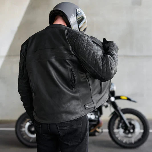 Motorcycle leatherwear collection featuring protective leather jackets, pants, vests and biker gear designed for road-ready style.