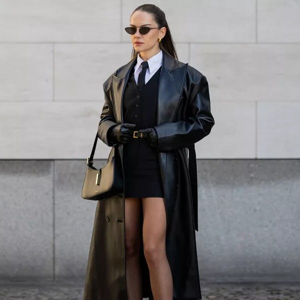 Women’s leather trench coats in premium leather with longline tailoring, classic belted design and elegant outerwear appeal.