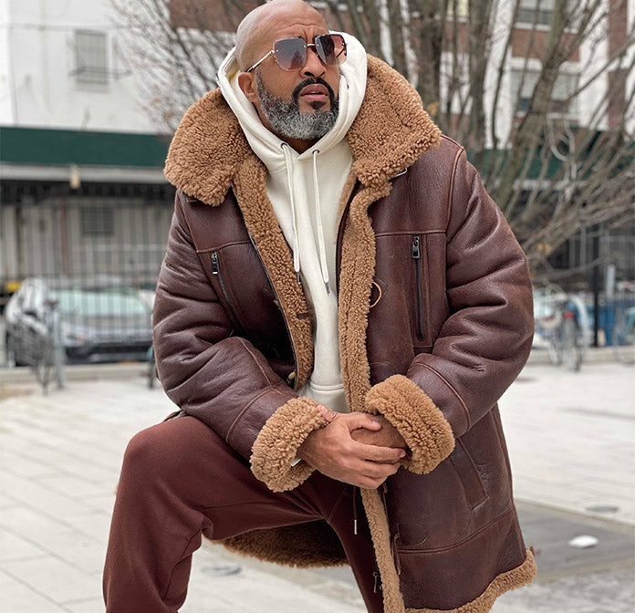 Men’s shearling coats in premium leather with warm shearling-style lining, longline winter design and classic masculine outerwear appeal.