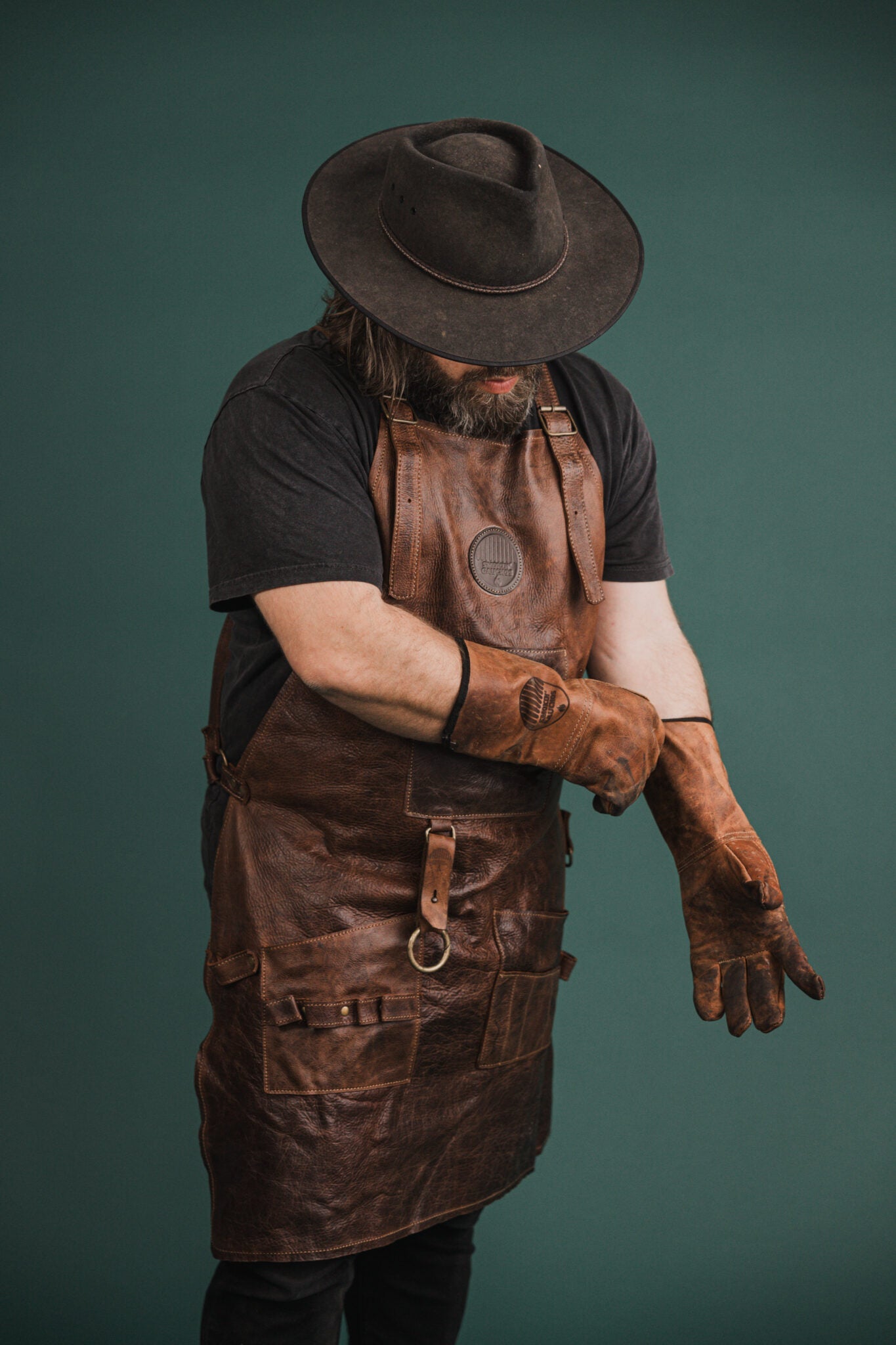 Leather accessories collection featuring premium leather bags, gloves, belts and small goods for refined everyday style.