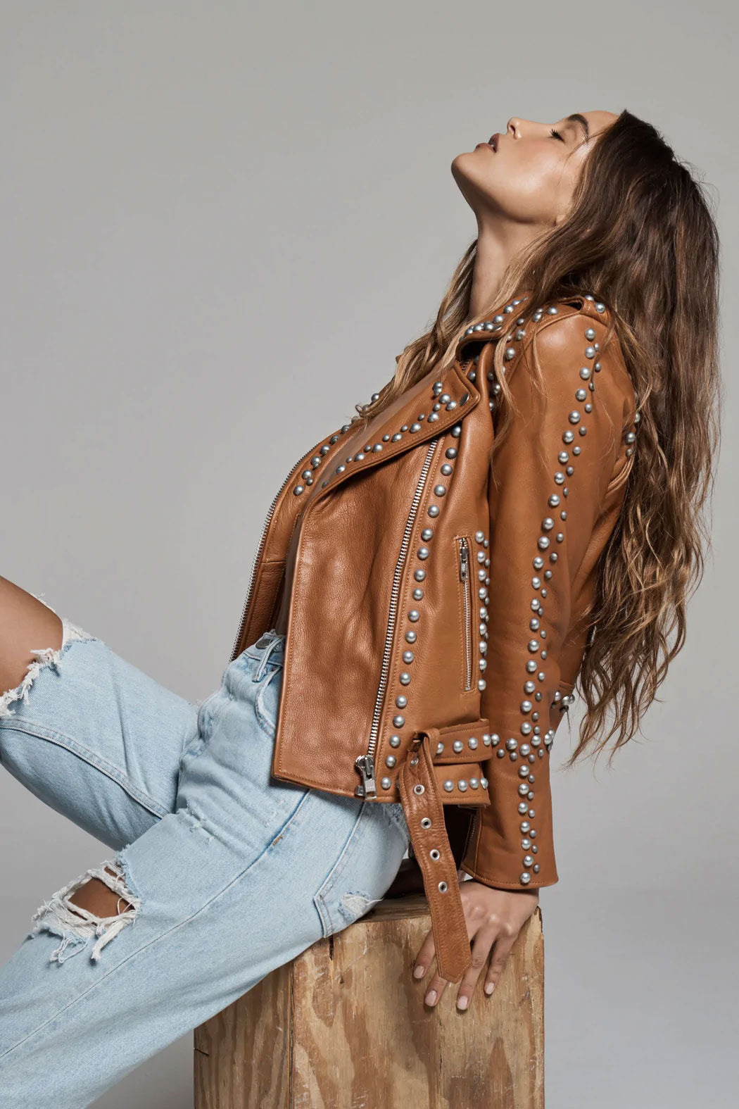 • spike leather jacket detail close up womens
