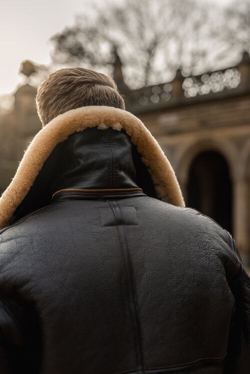 Black sheepskin aviator jacket with waist belt
