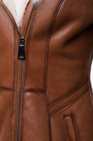 • shearling coat womens fur hood close up
