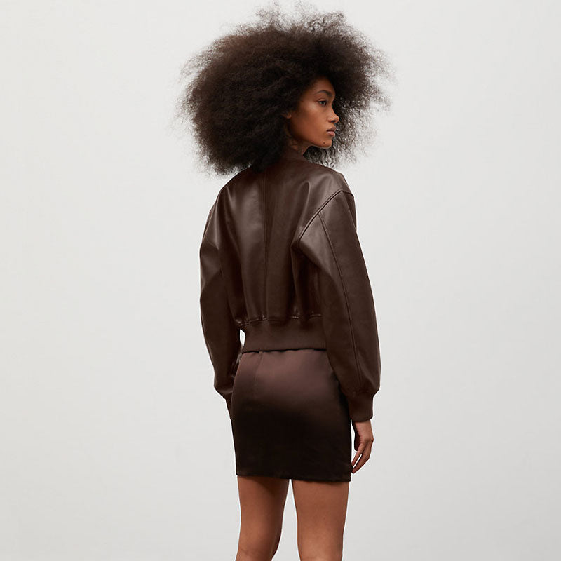 • womens flight jacket shearling interior close up

