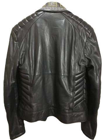• gold stud biker jacket detail close up
