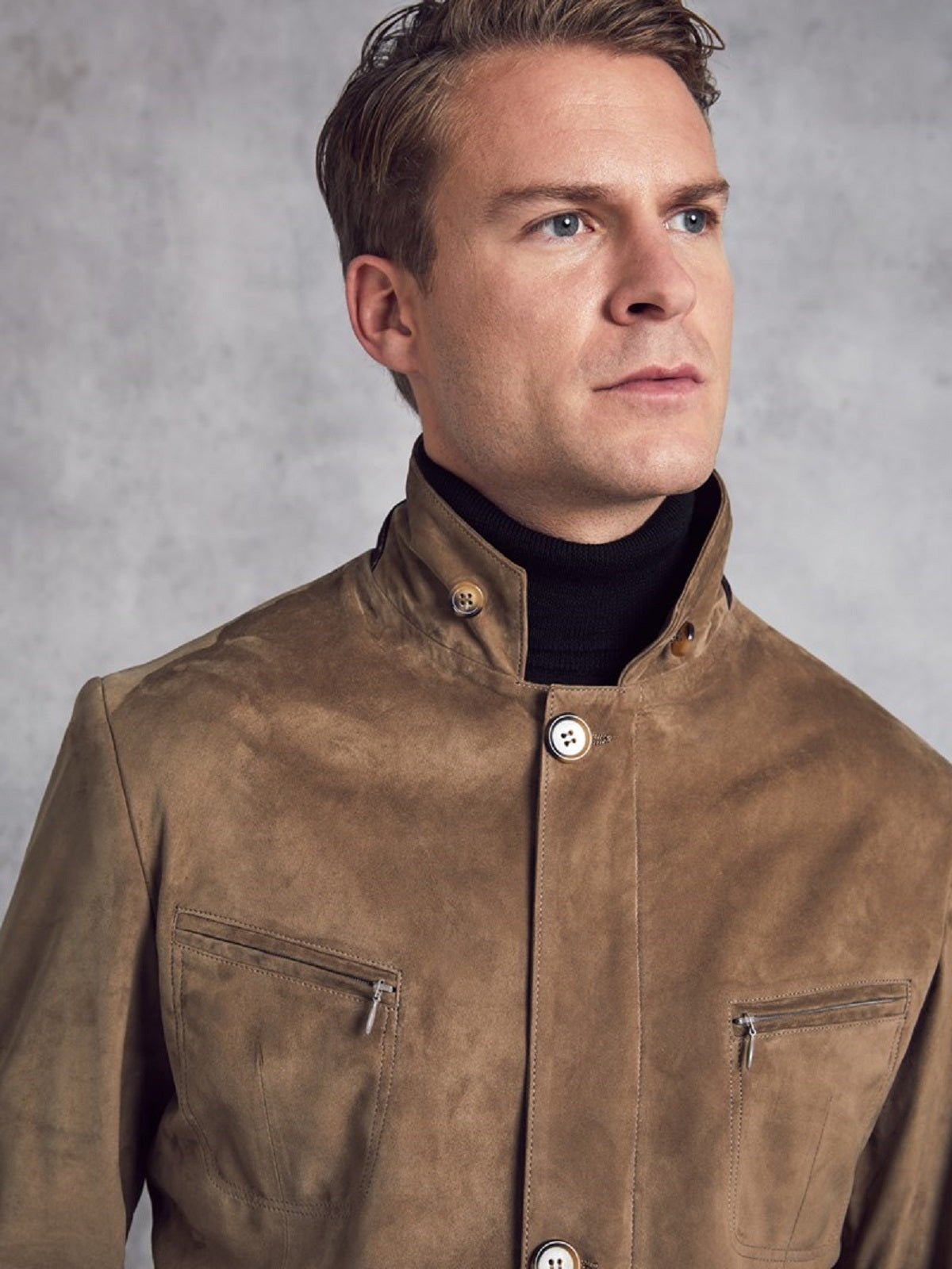 • mens suede jacket zipper and button closure detail
