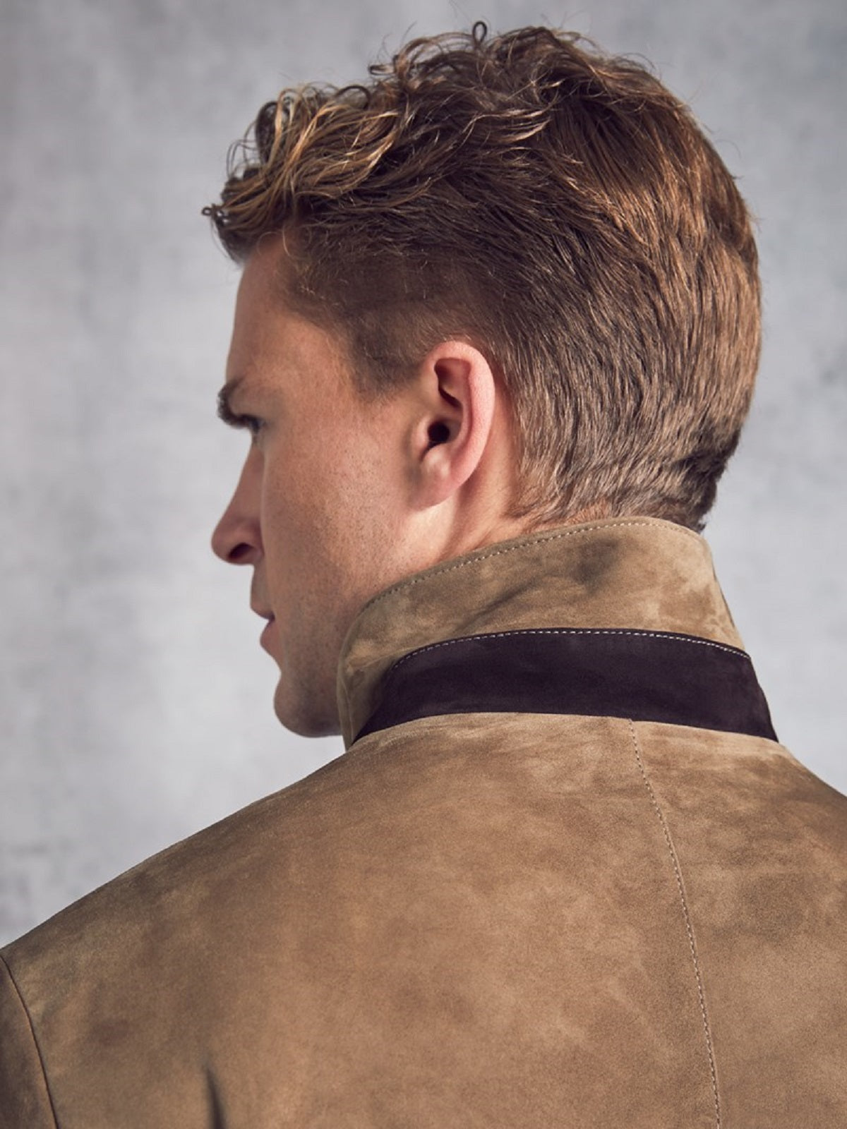 • suede leather texture close up brown jacket
