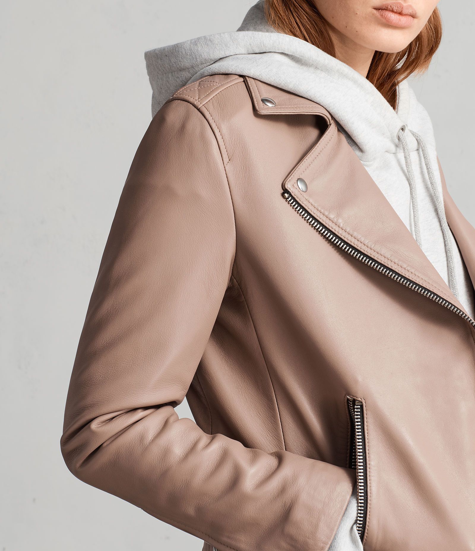• cream leather biker jacket zipper detail close up
